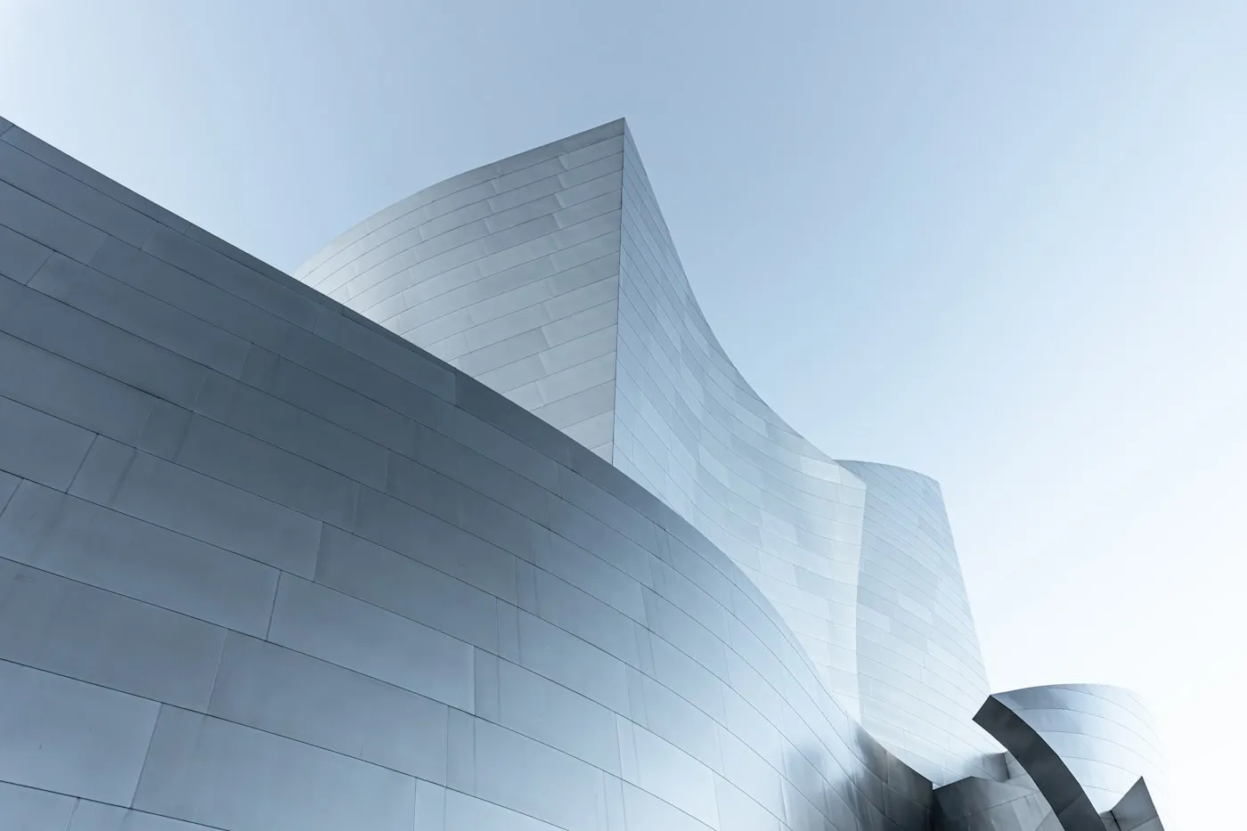 Clean architectural lines meeting at an angle against open sky.